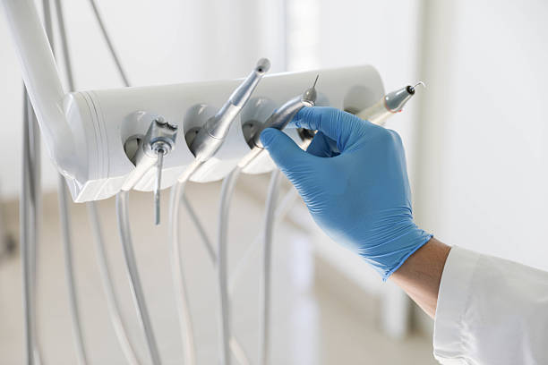 Professional Tooth Extraction technician working in Sealy, TX